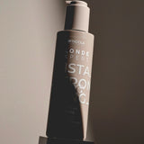 Indola Blonde Expert InstaStrong Leave-In Cream 145ml – Cremă fără clătire cu tehnologie Bond, protecție termică și întărire instantă pentru părul blond, sensibil sau tratat chimic